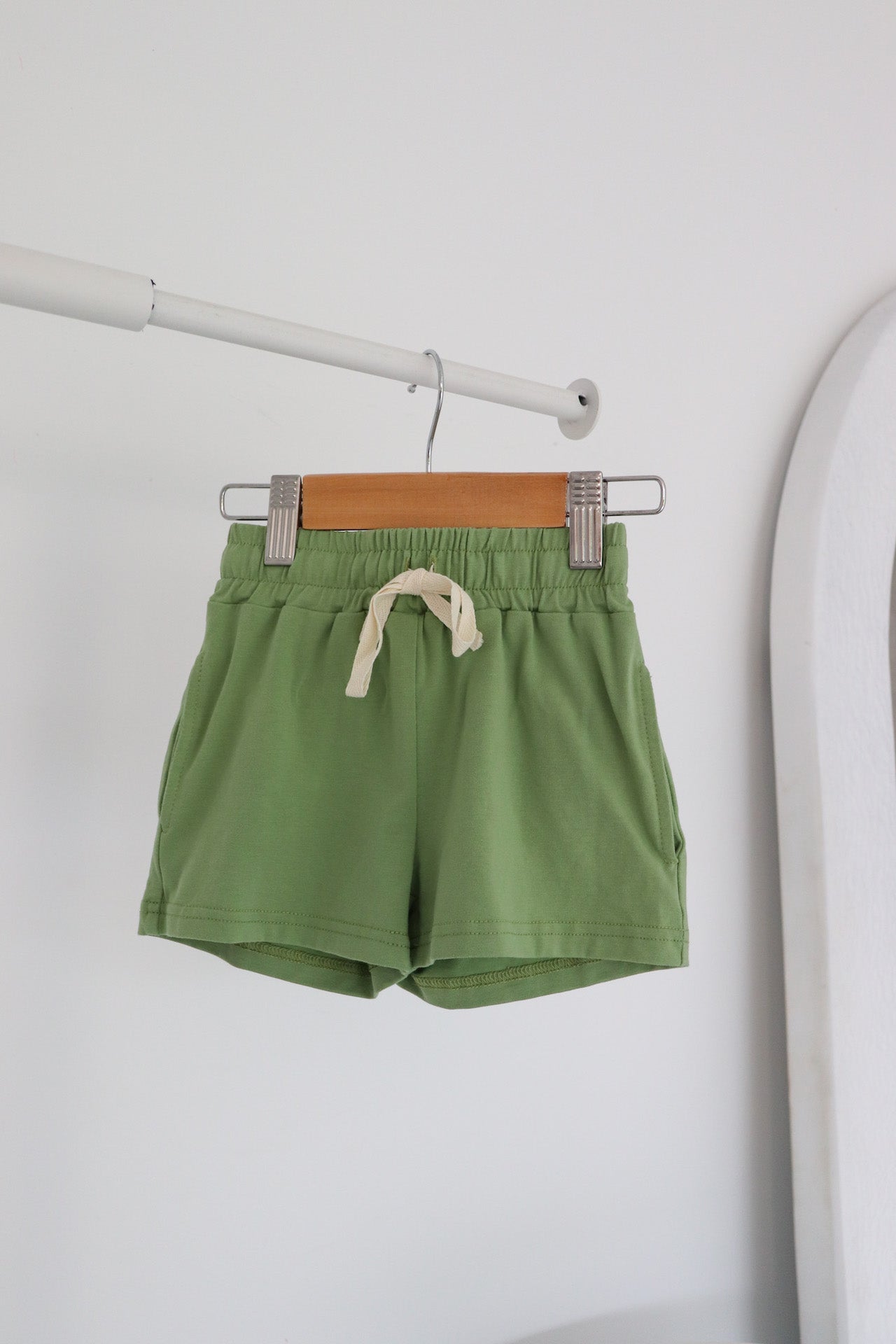 Hanging green shorts for child