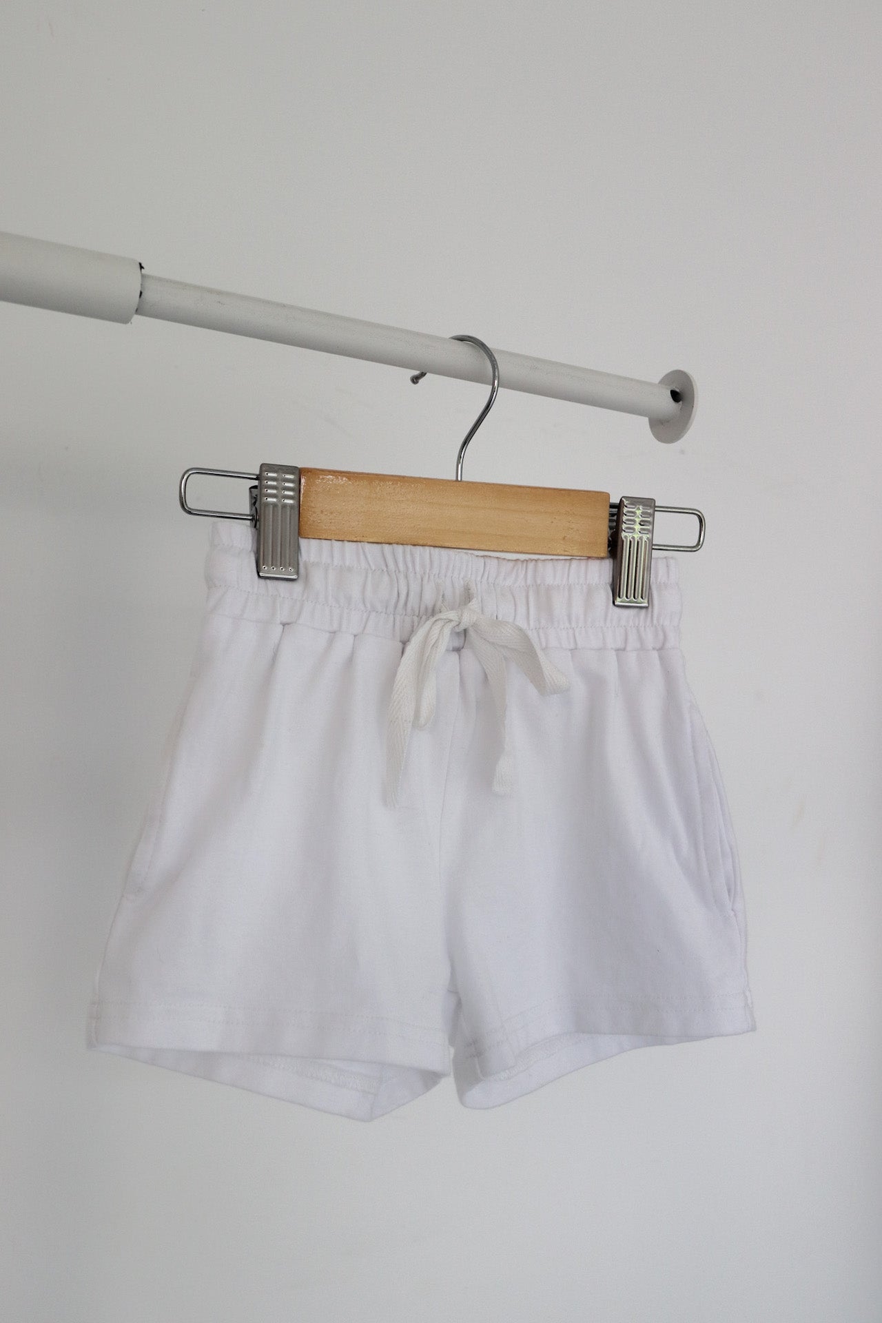Hanging white shorts